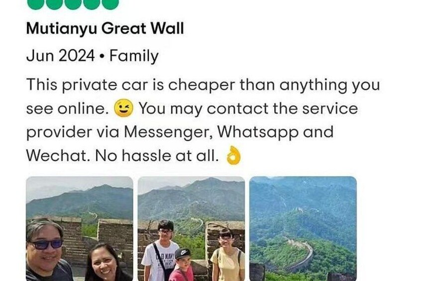 A family at the Mutianyu Great Wall, with views of the wall and surrounding landscape. 2