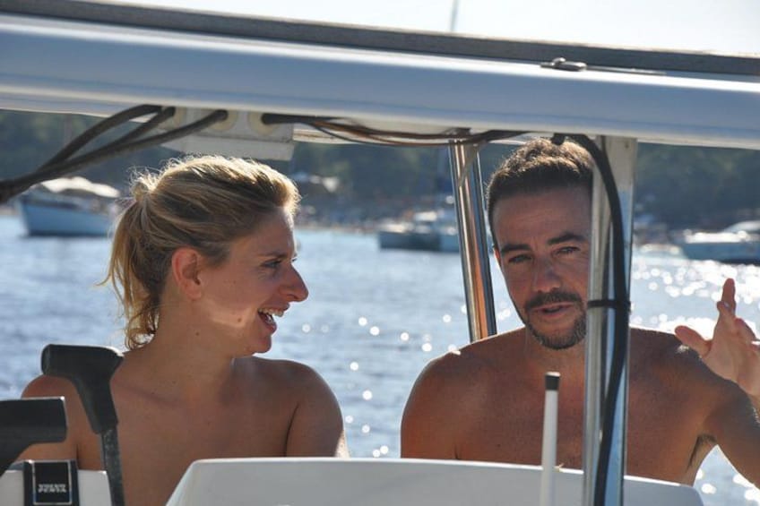 One of our captains, giving a customer a quick sailing lesson 4