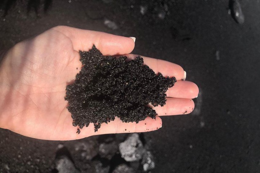 Black sand in hand 2