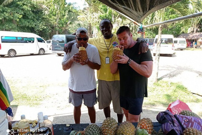 Sipping on a fresh pineapple drink 2