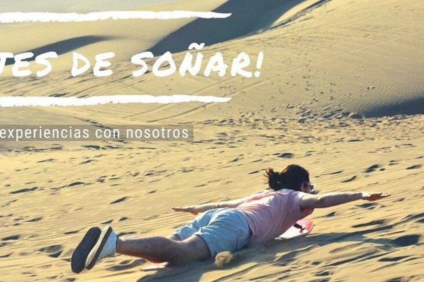 A person lying on sand dunes. 2