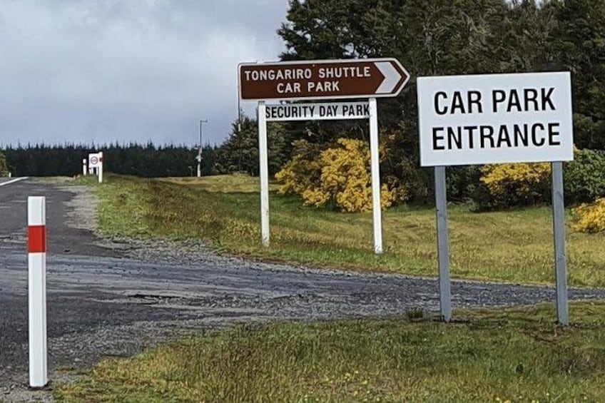 Directional signs for Tongaririo Shuttle Car Park and Security Day Park, and a Car Park Entrance sign. 5