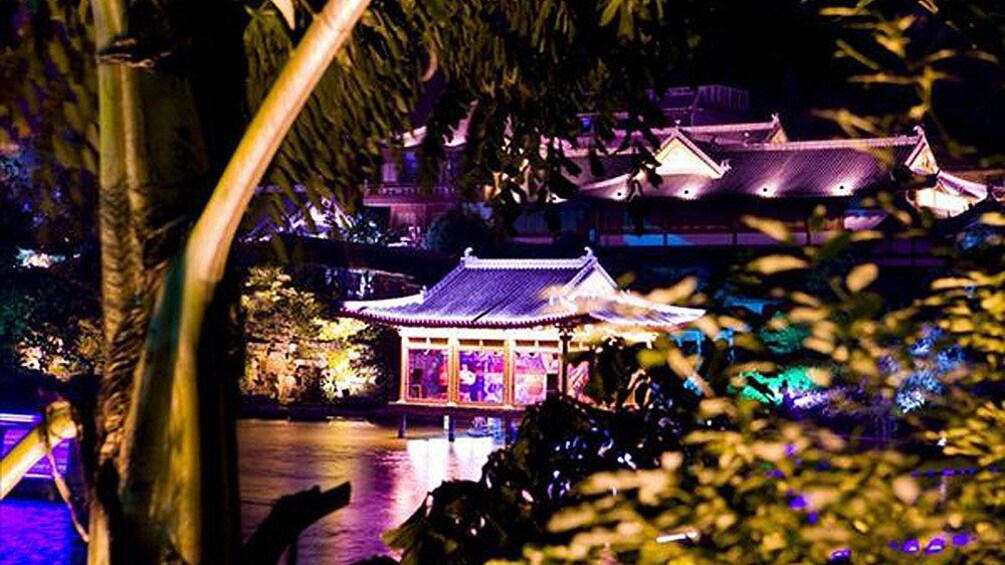 illuminated temple along the river in Guilin