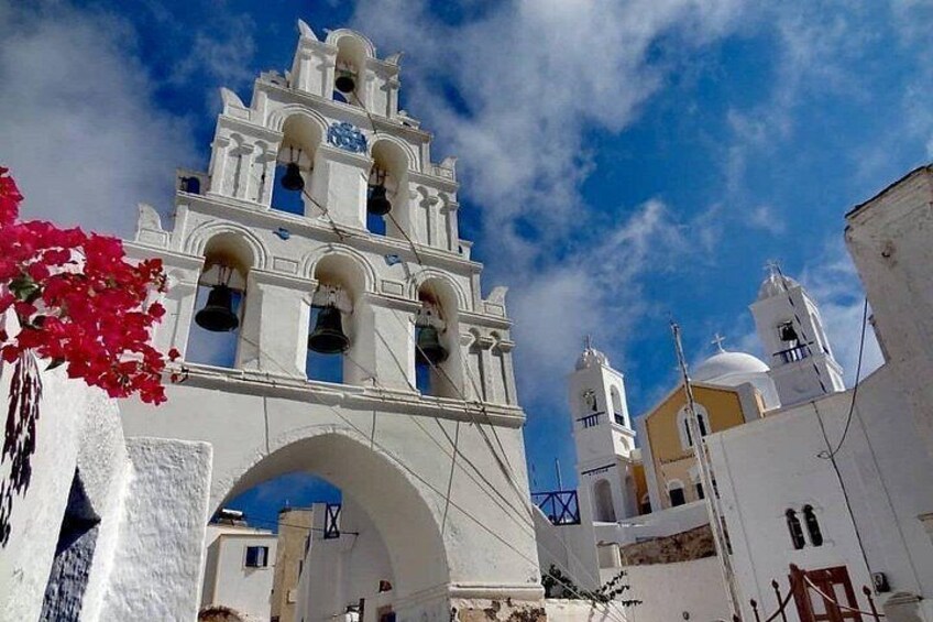 Village of Megalochori: A charming village with picturesque winding alleys that lead to a traditional paved square with beautiful bougainvillea’s 3