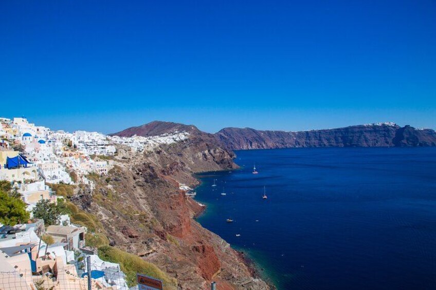 Village of Oia: The majestic famous town with the most unapparelled beauty and astonishing views, whitewashed houses carved into the rugged clifftops that overlook the caldera. 2