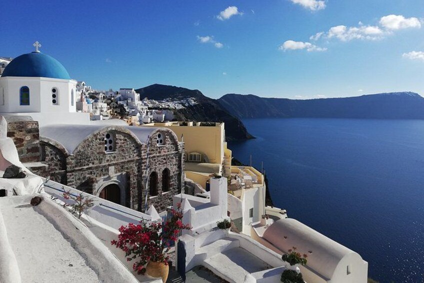 Village of Oia: The majestic famous town with the most unapparelled beauty and astonishing views, whitewashed houses carved into the rugged clifftops that overlook the caldera. 3