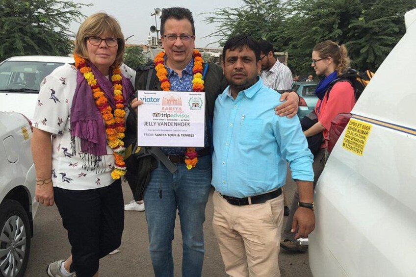 Traditional welcome by manager with placard 2