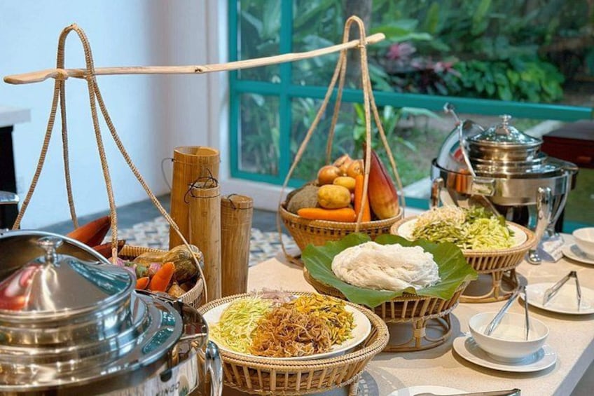 A table with various food items and cooking utensils. 5