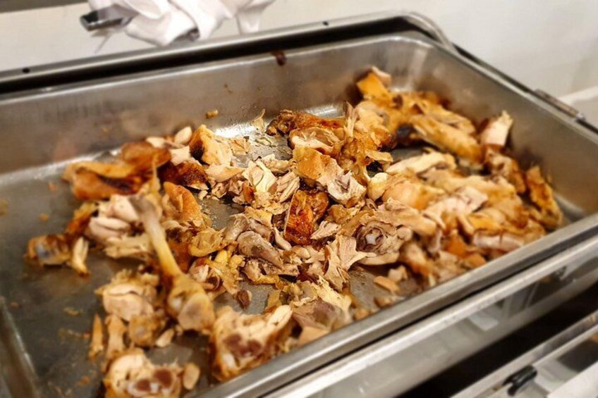 A tray of shredded chicken. 4