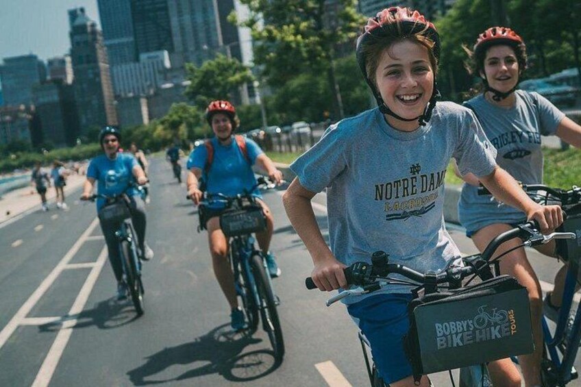 Kid smiling faces say it all on our Family Friendly Chicago Food & Bike Tour. Ride a Bicycle, taste local favorites, and enjoy one of the best Kid-Friendly Things to do in Chicago. 1