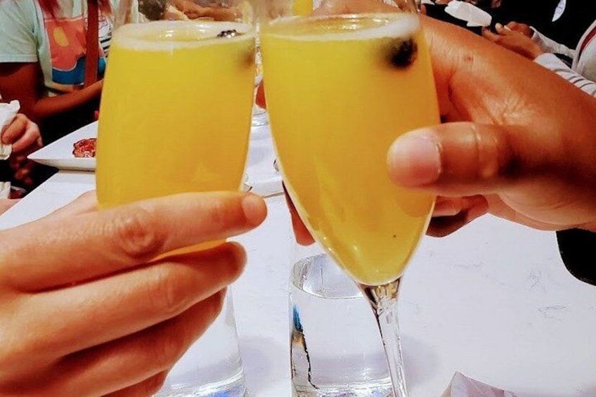 Two people holding champagne glasses. 2