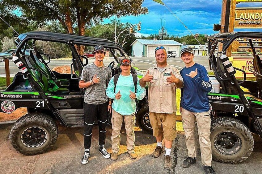 Our guide Jesse and his happy guests at the Moab Tourism Center. 4