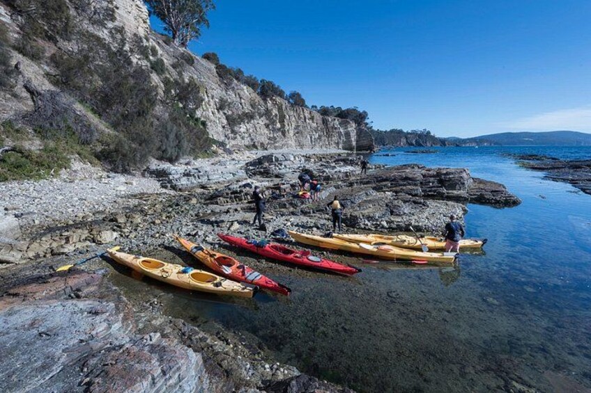 Enjoying a break while kayaking along Hobart's coastline 2
