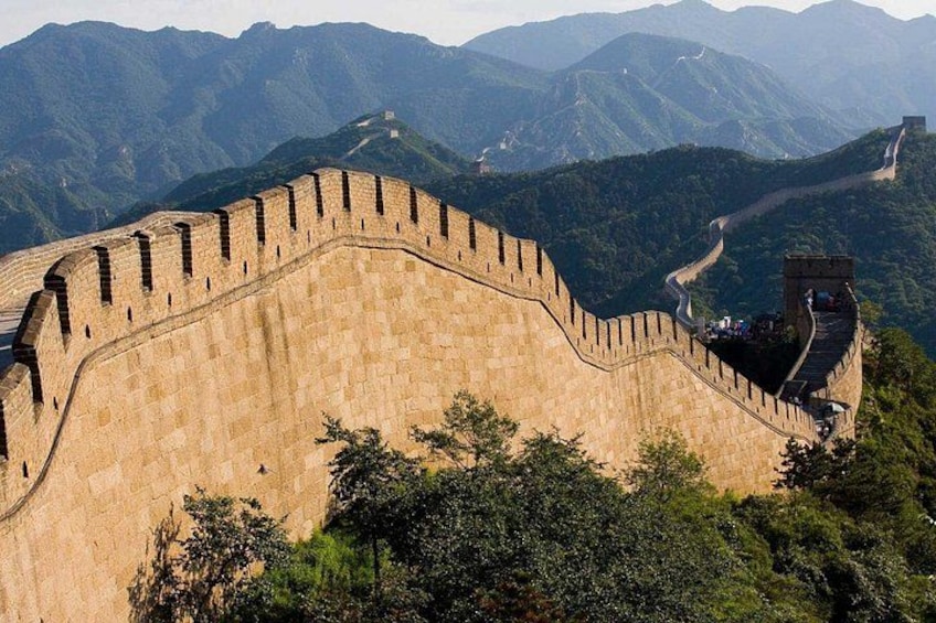 The Great Wall of China winding through mountainous terrain. 2