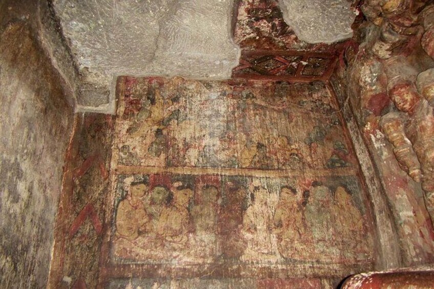 An ancient mosaic with geometric patterns and figures. 4