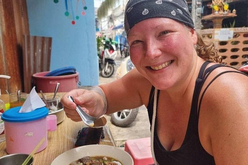 Eating noodles on the street 3