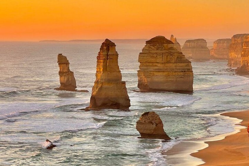 Coastal rock formations at sunset. 1