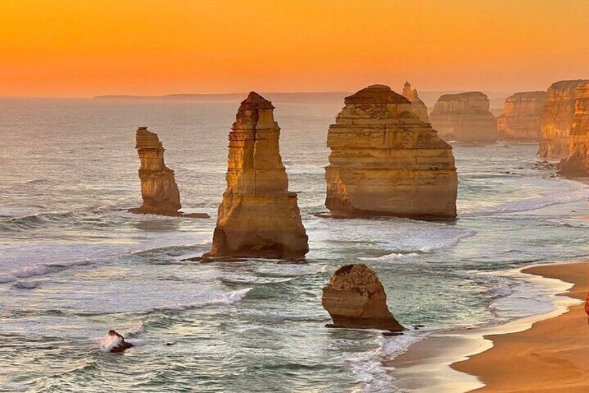 Coastal rock formations at sunset. 1