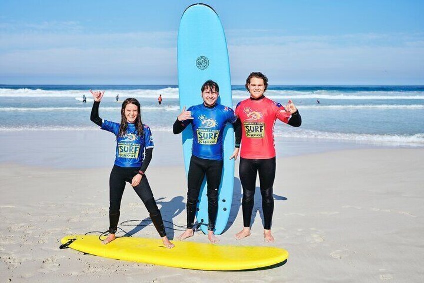 A special moment shared by a couple in our private group lesson. Love and adventure come together on the waves.