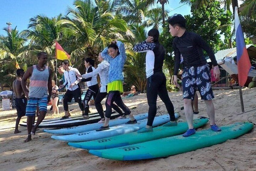 Surf lessons session for visitors from China which is conducted by our instructors at Hikkaduwa beach, Sri Lanka 4