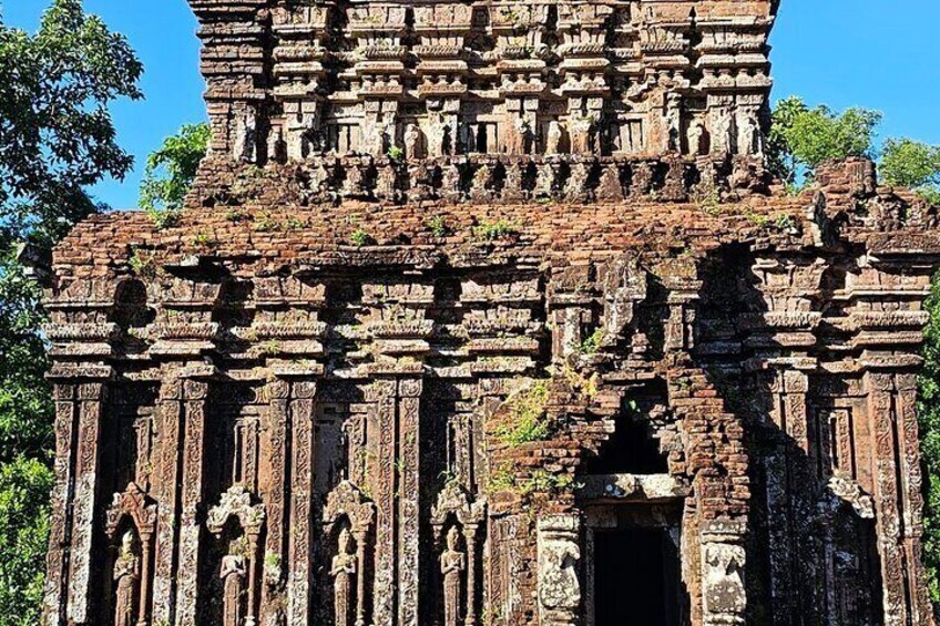 An ancient temple with intricate carvings and multiple tiers. 3