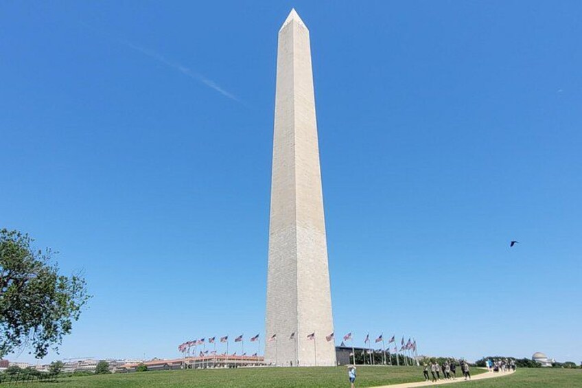 The Washington Monument stands tall at the center of the National Mall. 2