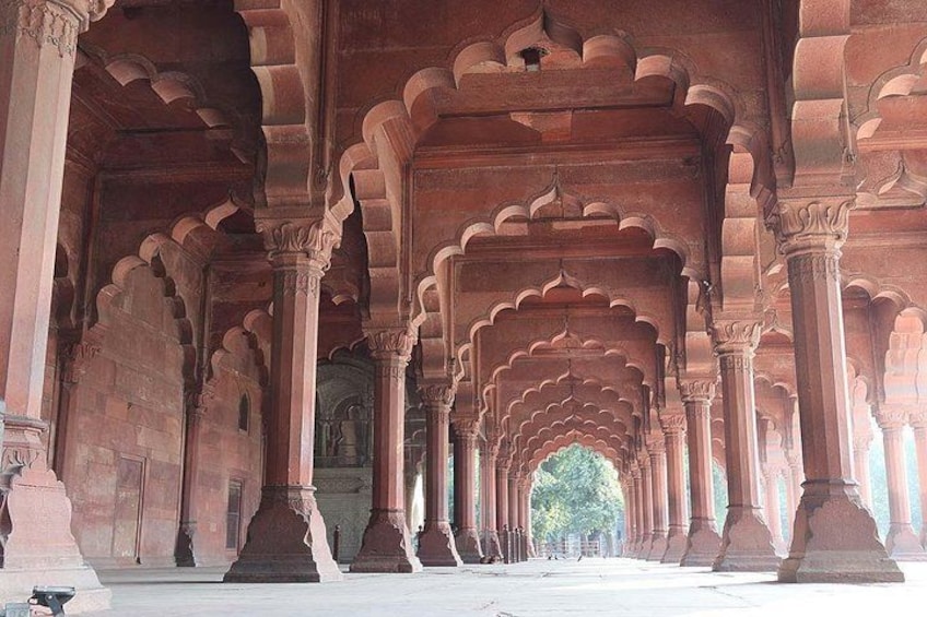 An architectural structure with arches and columns. 2