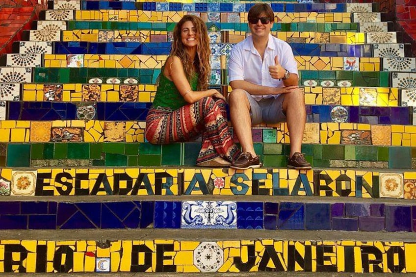A colorful mosaic staircase with the text 'ESECADARIA SELARON' and 'RIO DE JANEIRO' visible. 1