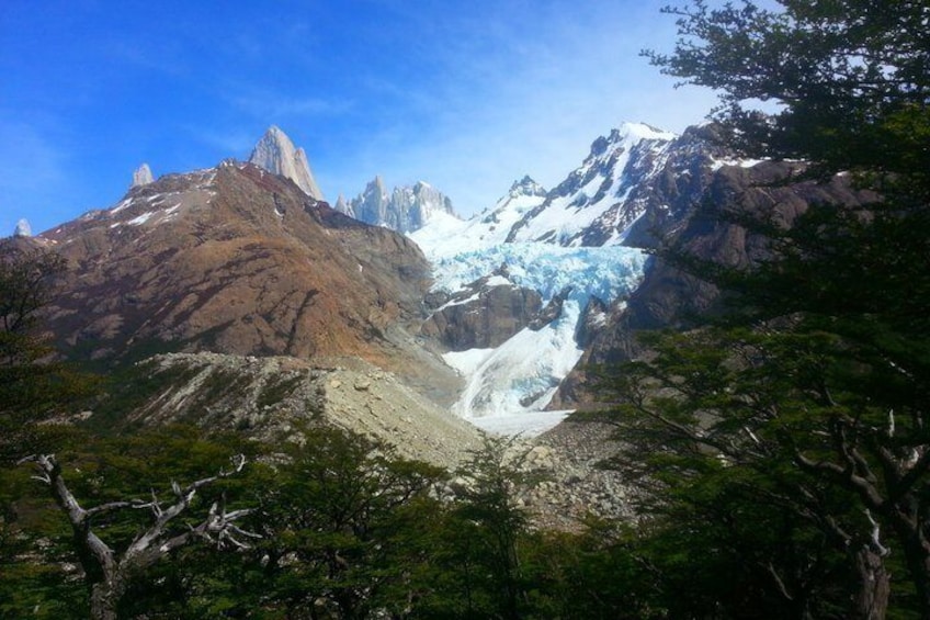 A glacier with a mountain in the background. 4