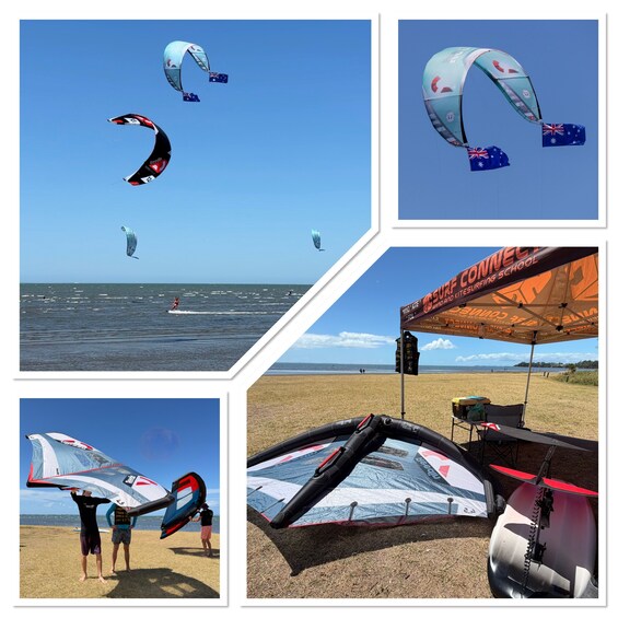 A beach with multiple kitesurfing activities, a surf school tent, and a person handling a kite. 3