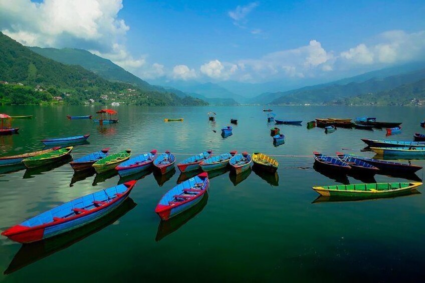 Boat waitin gfor customer and adding beauty for the Fewa Lake 2