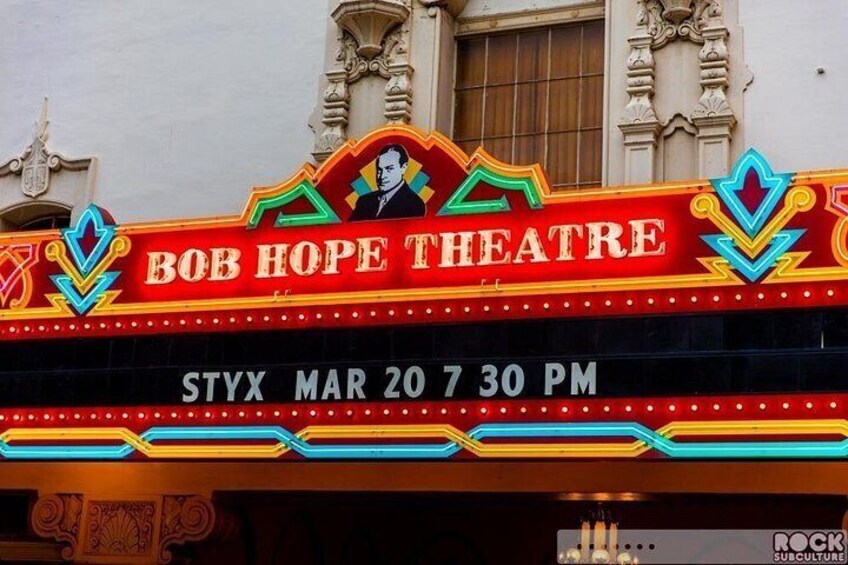 A theater marquee with 'BOB HOPE THEATRE' and a date 'STYX MAR 20 7 30 PM'. 5