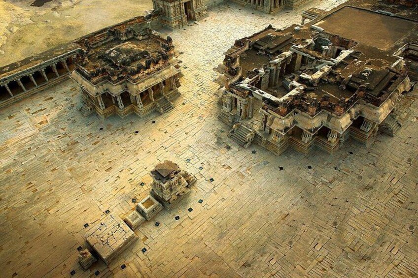 An ancient temple complex with intricate architecture and a large open courtyard. 5
