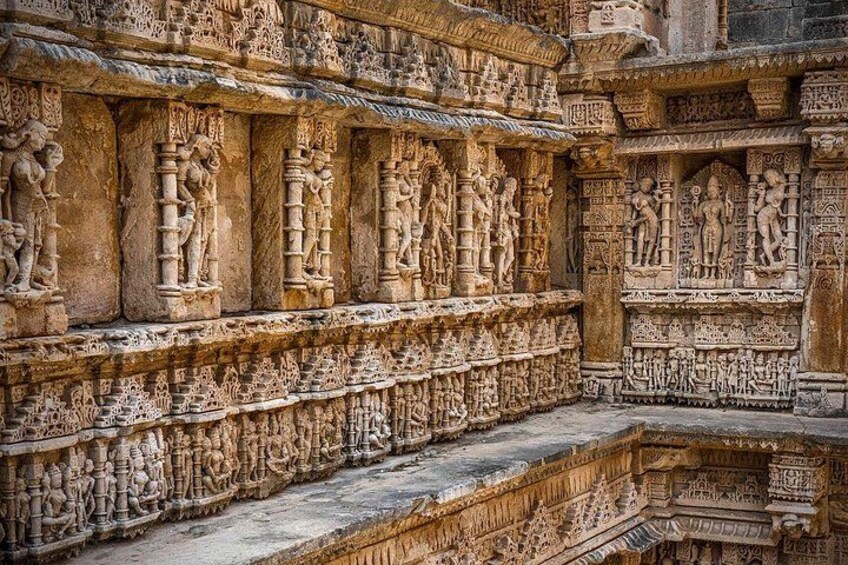 Detailed stone carvings on ancient temple walls. 5