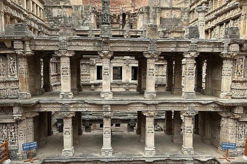 An ancient temple with intricate carvings and multiple levels. 3