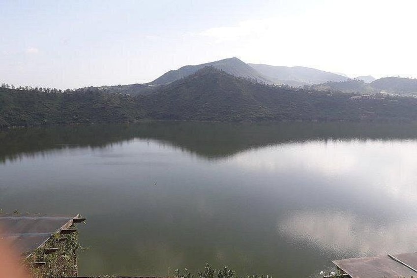 A calm lake with a mountain in the background. 2