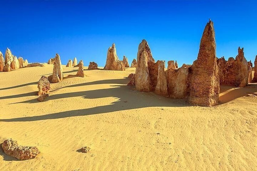 A desert landscape with prominent rock formations. 1