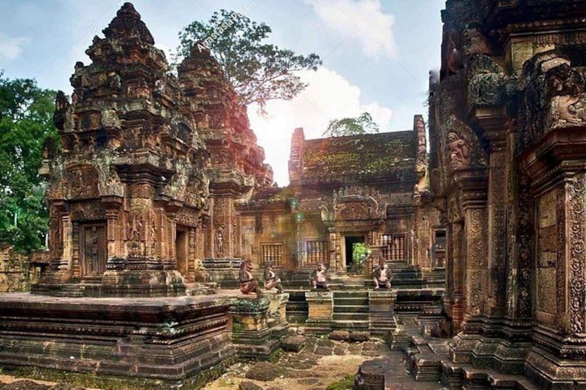 An ancient temple complex with intricate carvings and tiered structures. 3