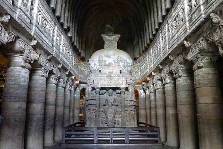 An ancient temple with intricate carvings and a central dome. 2