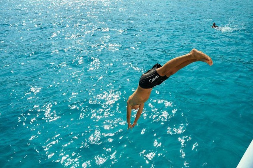 A person diving into the water. 2