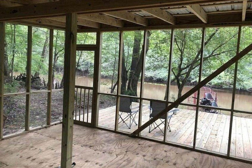 There is a beautiful view of the river from the screened platform. 3