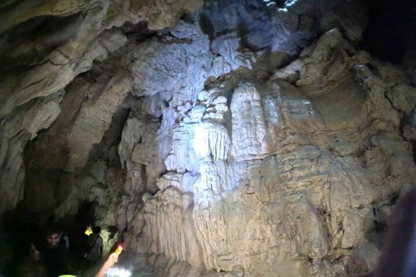 A cave with stalactites and stalagmites. 2