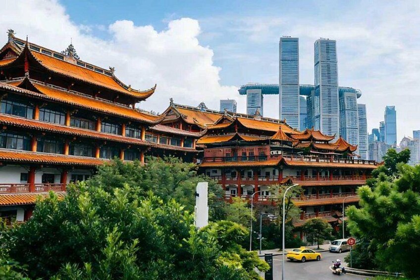 Traditional Chinese architecture with modern skyscrapers in the background. 3