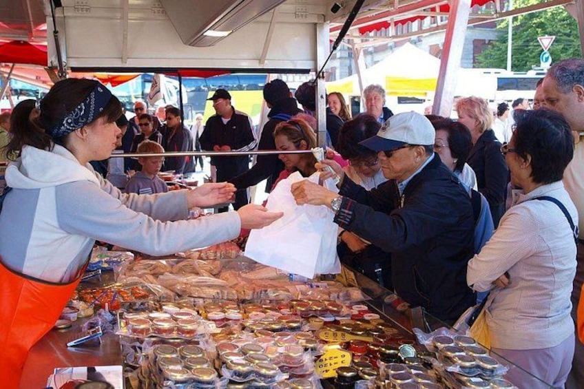 A street food vendor with a variety of packaged goods on display. 2