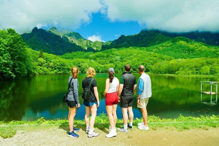 Captivated by Kagami Pond's summer beauty — a peaceful highlight of our Togakushi tour. 5