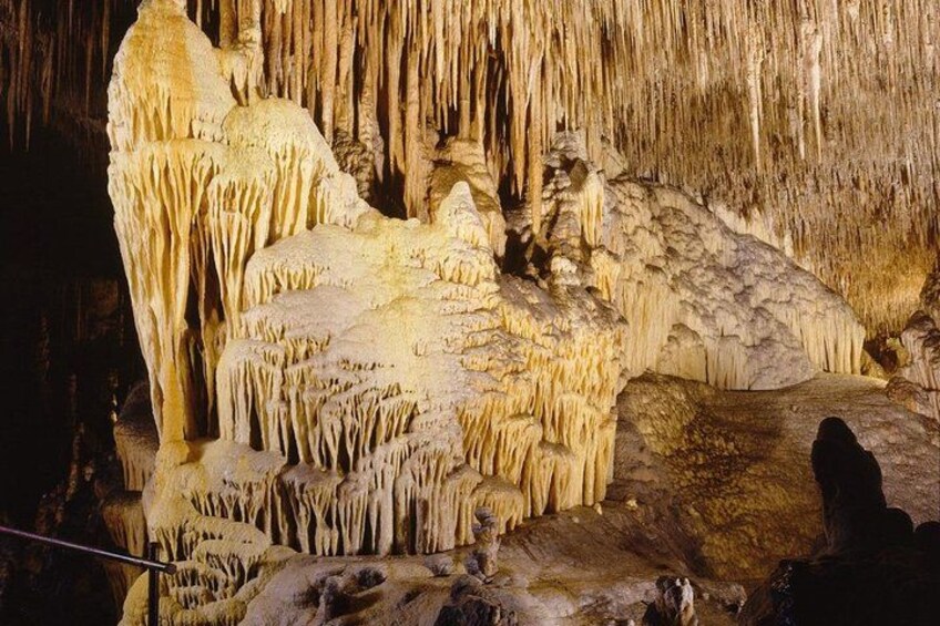 A cave with stalactites and stalagmites. 2