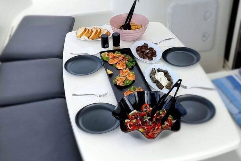 A table with various food items and utensils. 2