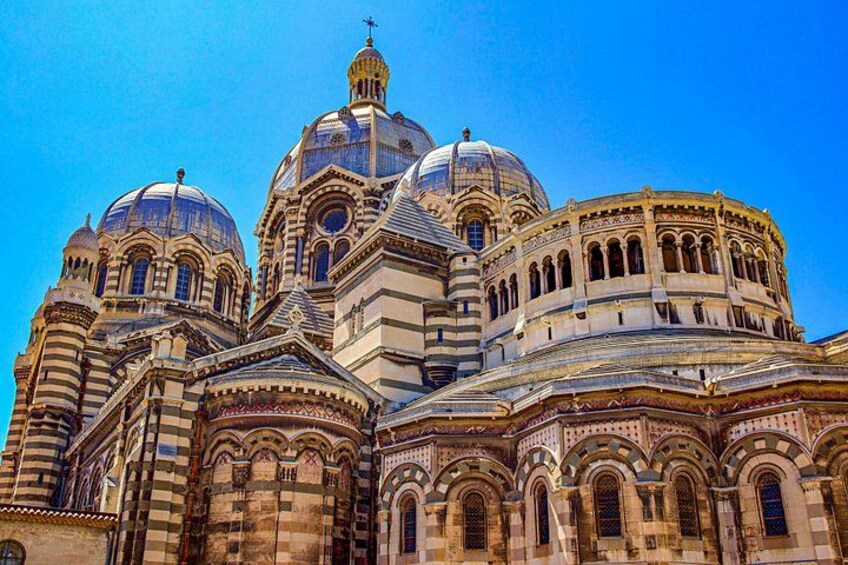 A large, ornate cathedral with multiple domes and intricate architectural details. 4