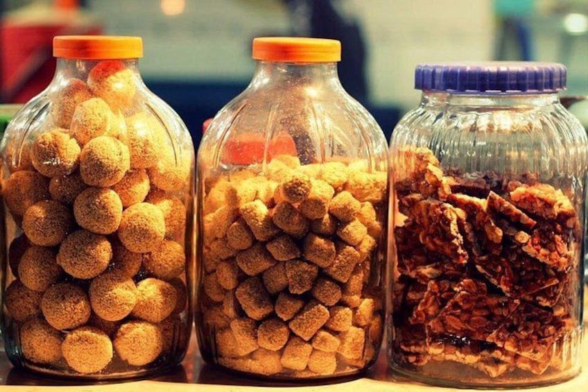 Three glass jars with different contents. 3