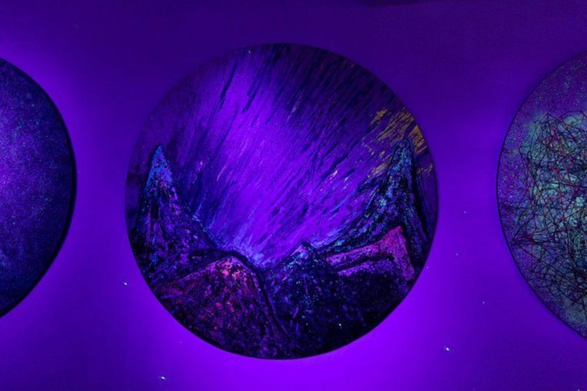 Three circular displays with abstract patterns. 5